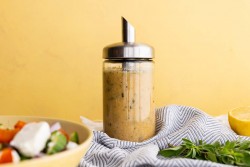 lemon-vinaigrette-in-bottle-beside-salad-scaled.jpg