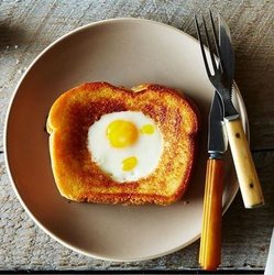 3930ae34-4c4f-4e62-bd40-09fcfed41152--2014-0923_grilled-cheese-egg-in-a-hole-020.jpg